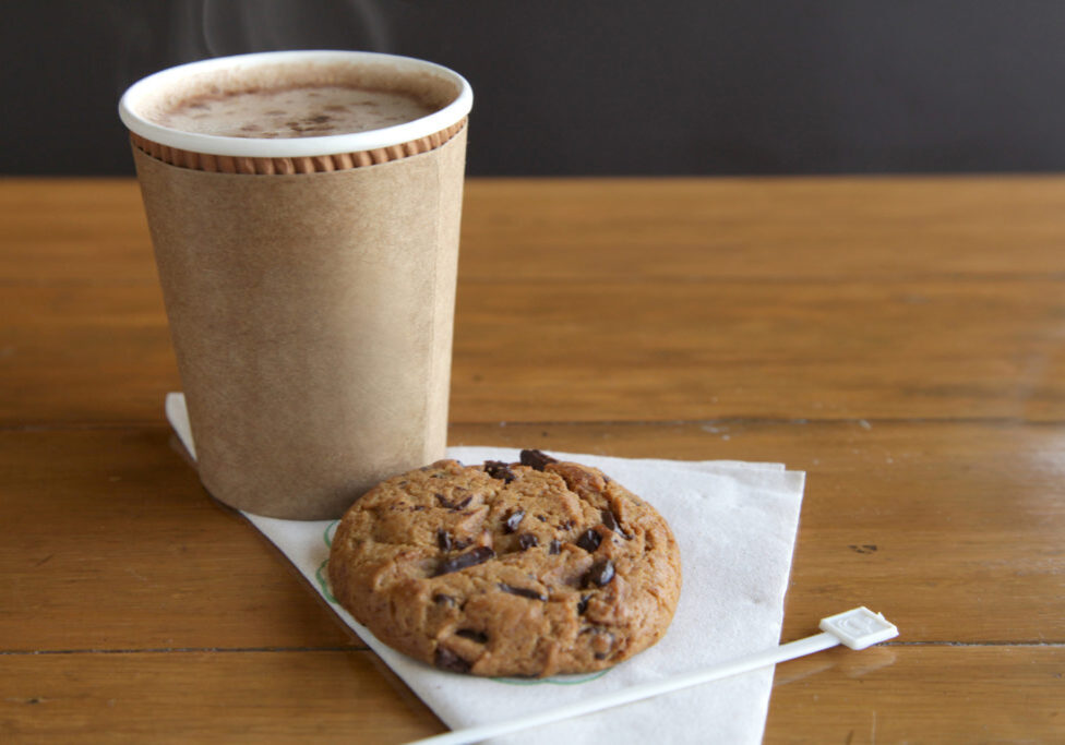 Coffee and choc chip biscuit on a paper napkin