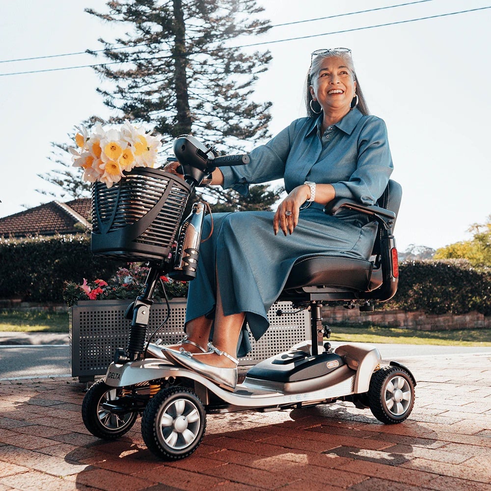 A woman driving a Delta Scooter